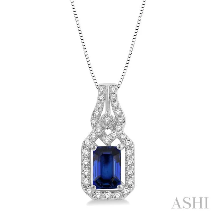 1/5 Ctw Interlocking Round Cut Diamond & 6x4 MM Emerald Shape Sapphire Precious Pendant With Chain in 14K White Gold