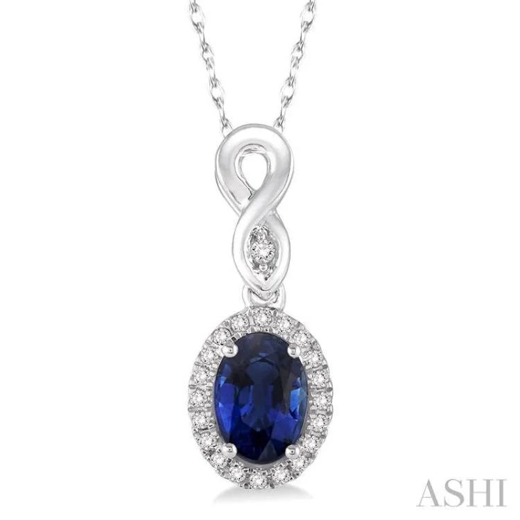 6x4 MM Oval Cut Sapphire and 1/10 Ctw Round Cut Diamond Pendant in 14K White Gold with Chain