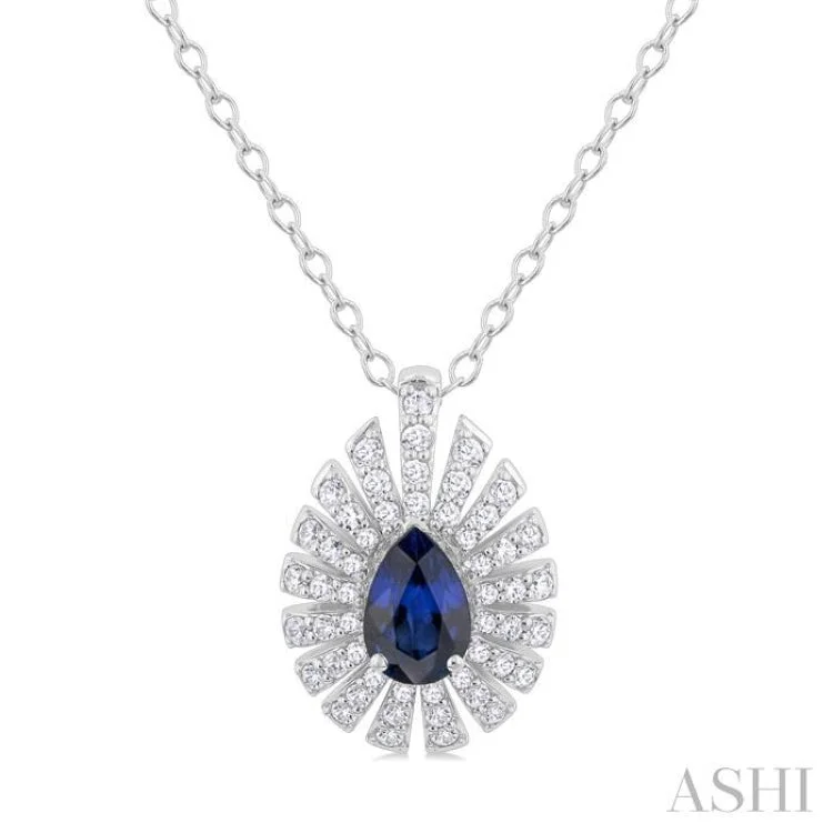 1/3 Ctw Starburst 6X4 MM Pear Cut Sapphire and Round Cut Diamond Precious Pendant With Chain in 14K White Gold