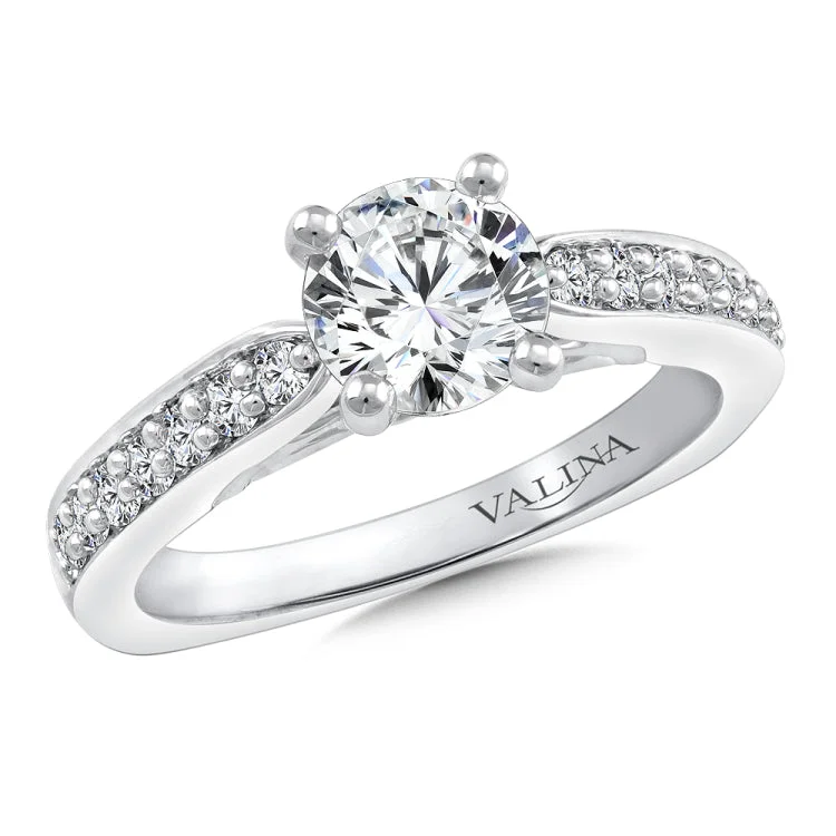 Diamond engagement ring mounting with side stones set in 14k white gold.