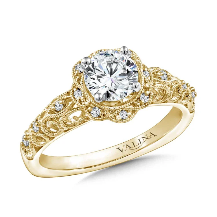 Diamond engagement ring mounting with milgrain and "love" letters detailing and side stones set in 14k yellow gold.