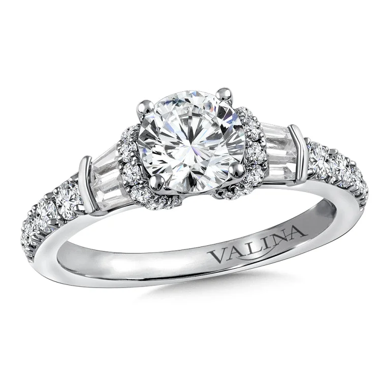 Diamond engagement ring mounting with baguette and round side stones set in 14k white gold.