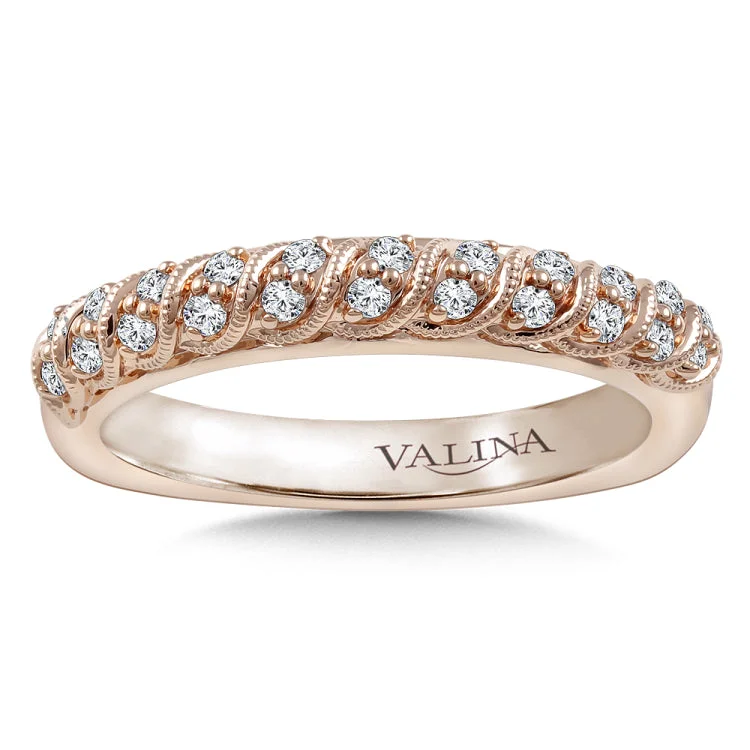 Diamond stackable wedding band with intricate milgrain detailing in 14k rose gold.