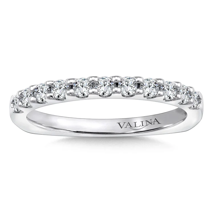 True fit matching diamond wedding band and a beautiful reminder of that special day for years to come.