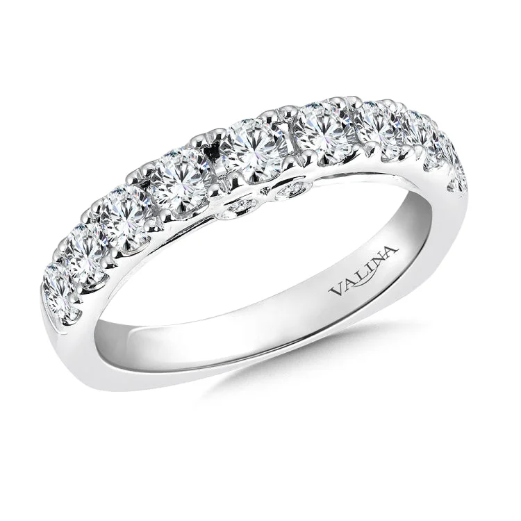 True fit matching diamond wedding band and a beautiful reminder of that special day for years to come.