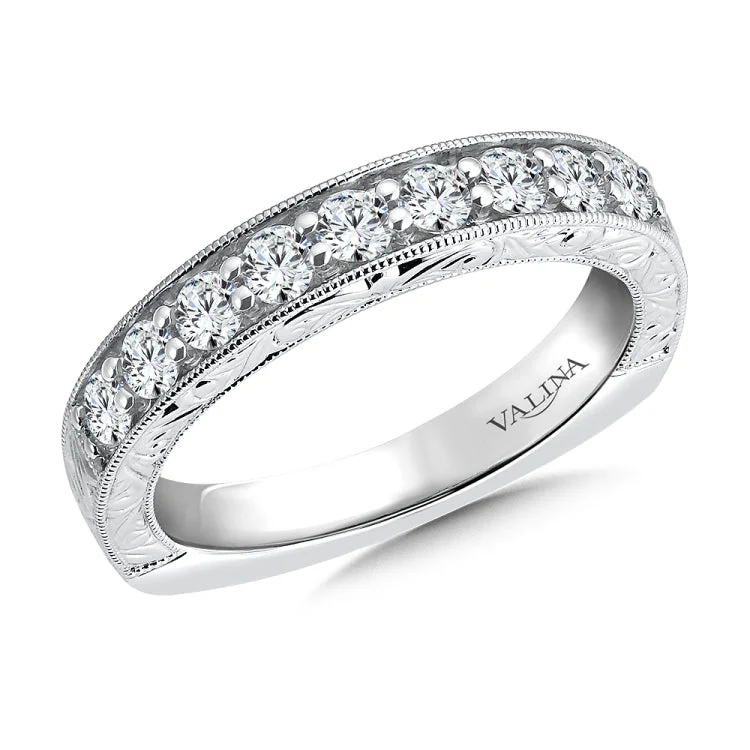 True fit matching diamond wedding band and a beautiful reminder of that special day for years to come.