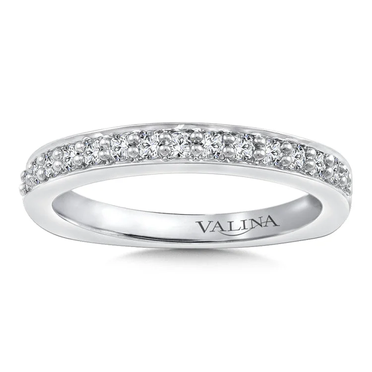 True fit matching diamond wedding band and a beautiful reminder of that special day for years to come.