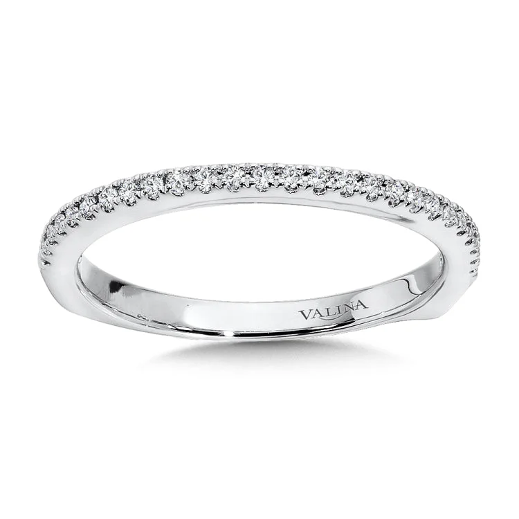 True fit matching diamond wedding band and a beautiful reminder of that special day for years to come.