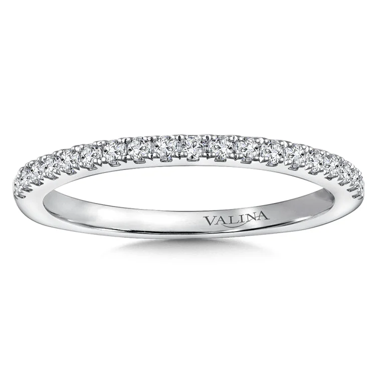 True fit matching diamond wedding band and a beautiful reminder of that special day for years to come.