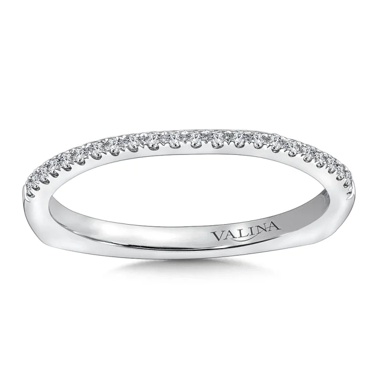 True fit matching diamond wedding band and a beautiful reminder of that special day for years to come.