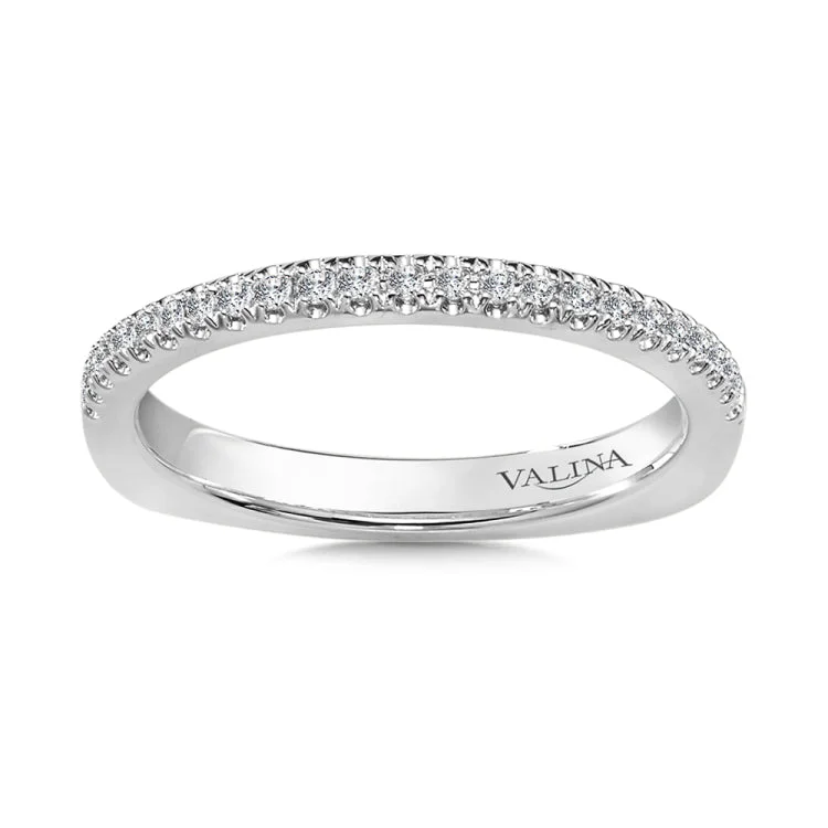 True fit matching diamond wedding band and a beautiful reminder of that special day for years to come.